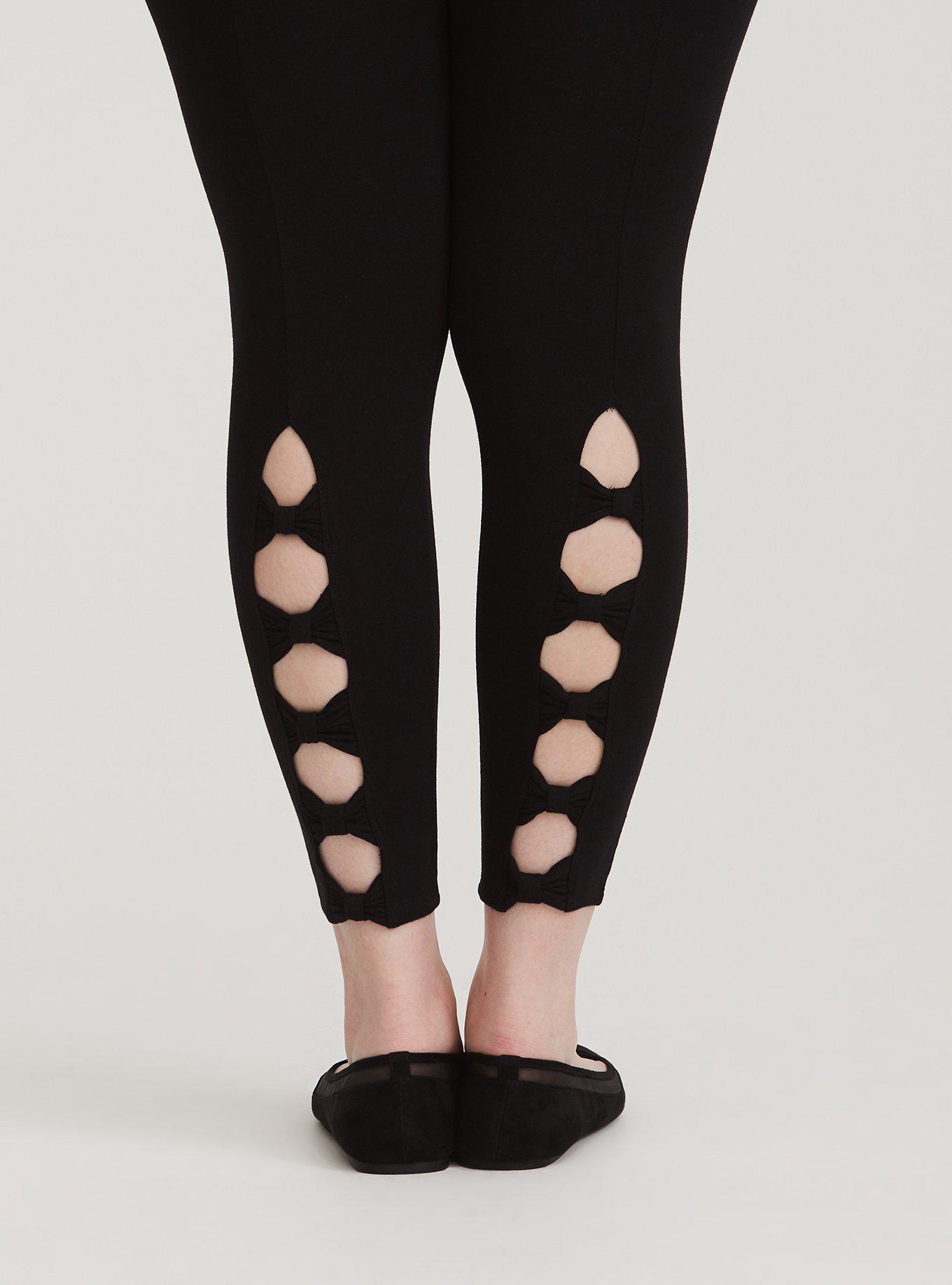 Black Bow Cut Leggings by Pushbutton on Sale