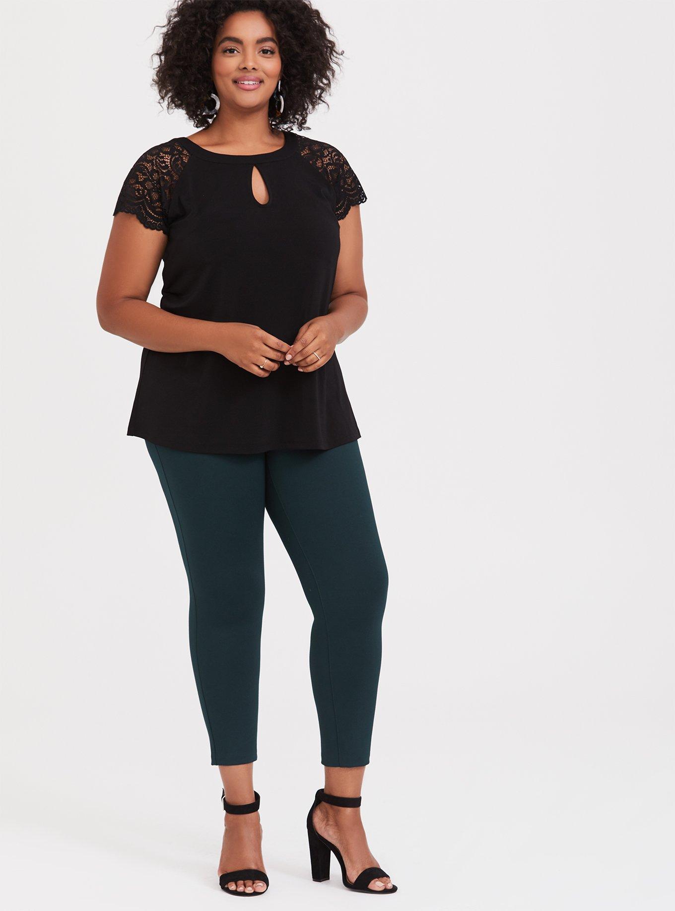 Torrid black blouse with key hole front and back and black lace sleeves!