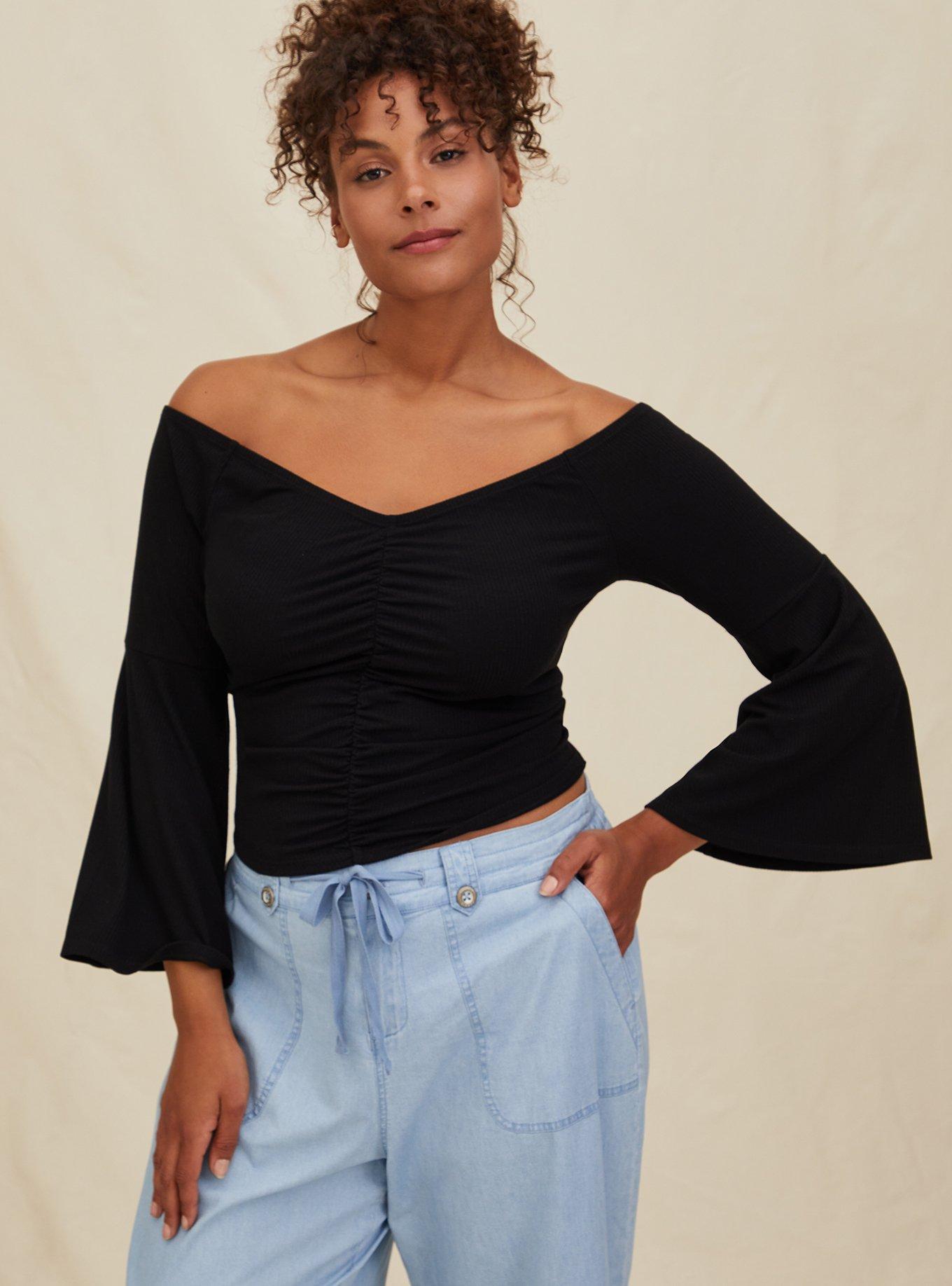 Black off the shoulder top with store bell sleeves