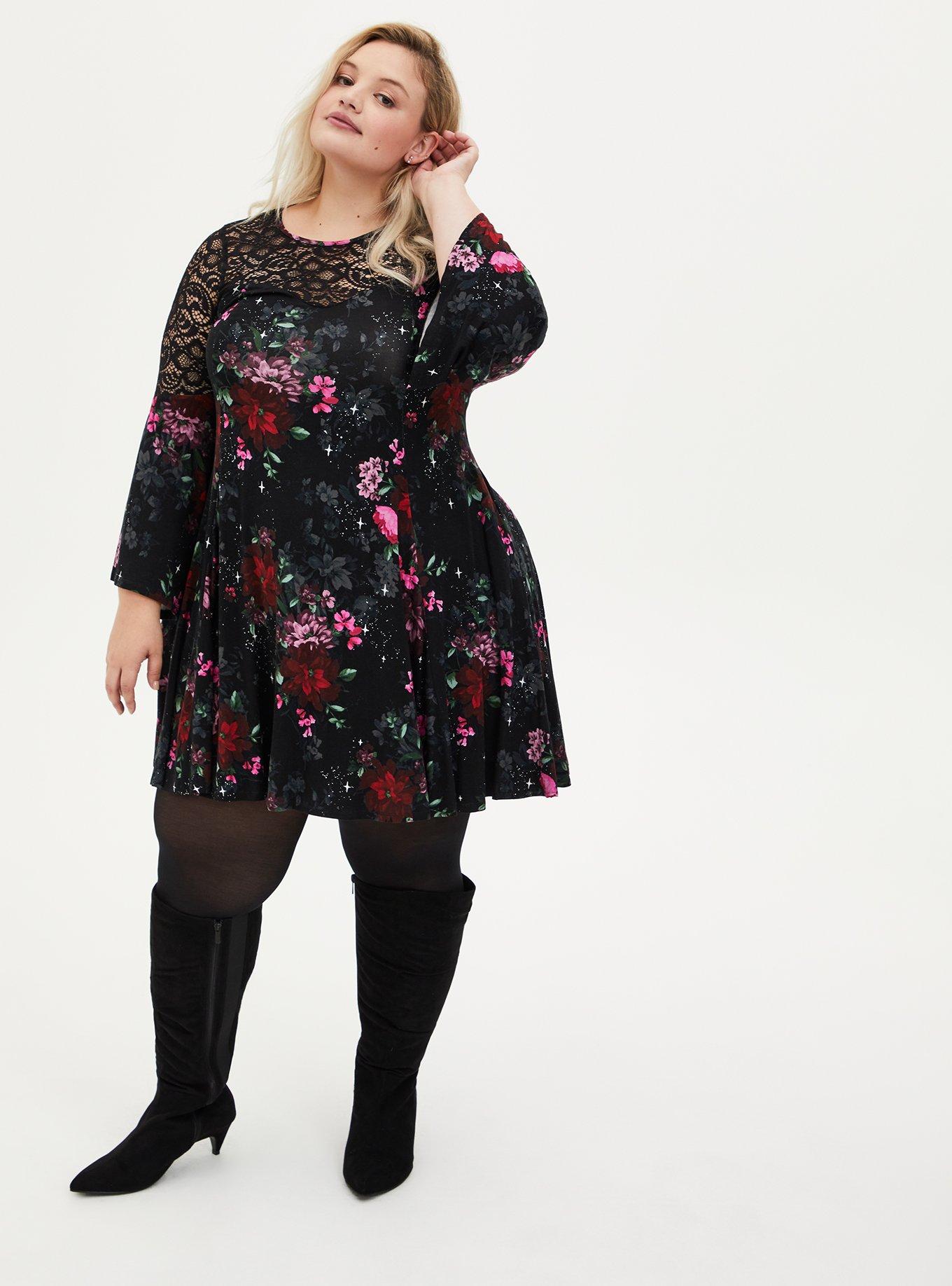 Torrid black blouse with key hole front and back and black lace sleeves!