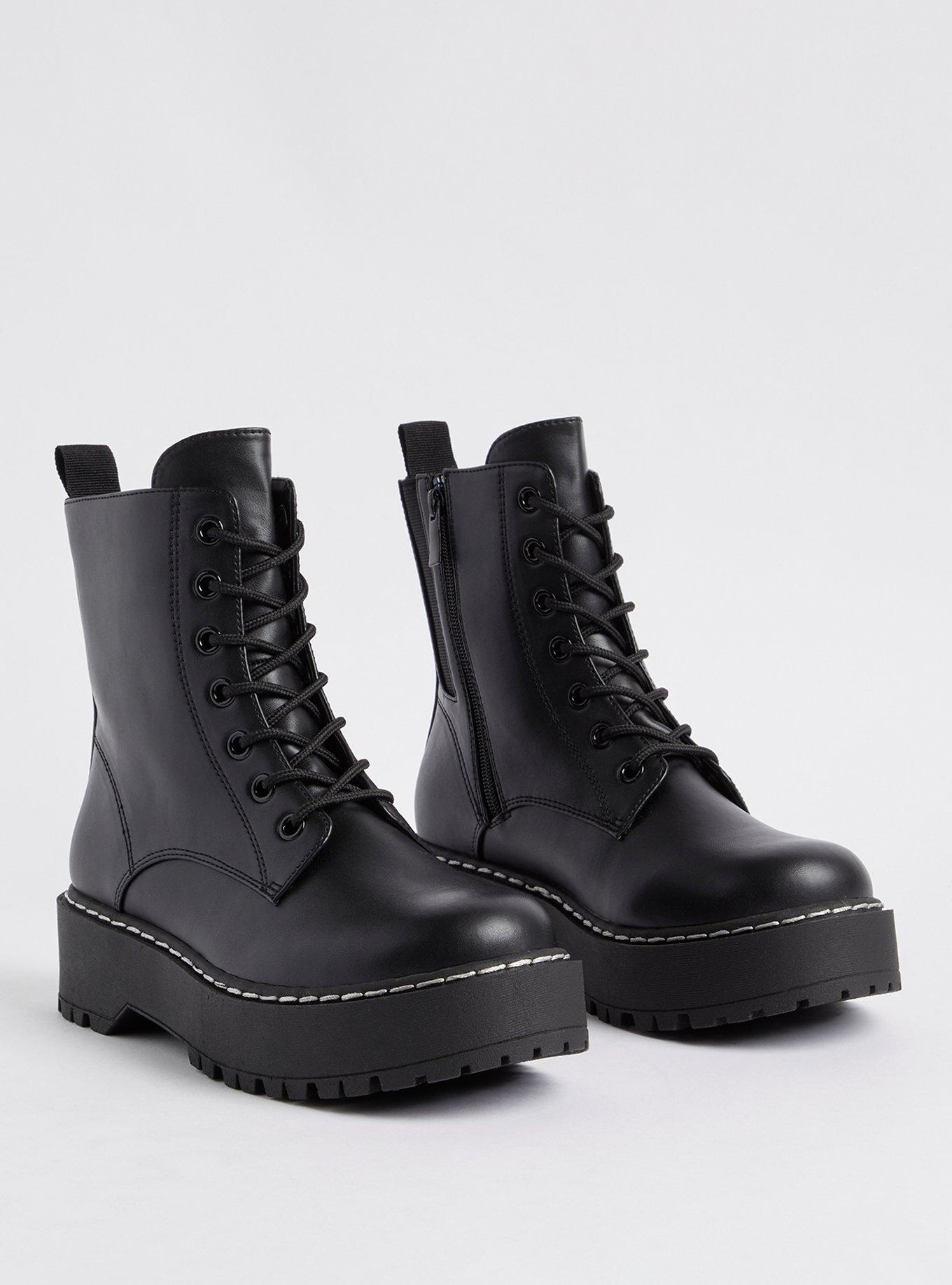 Black combat boots shop with white laces