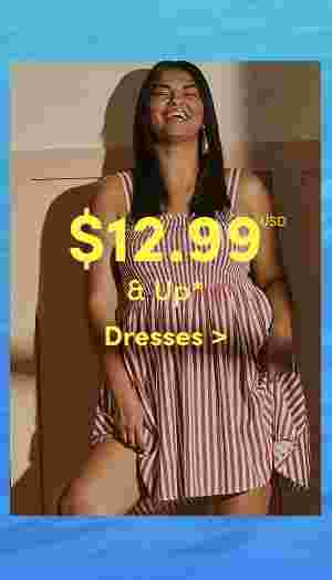 Smiling woman in a red and white striped sleeveless dress standing indoors with sunlight casting shadows. Overlaid text reads 12.99 USD and up, Dresses.