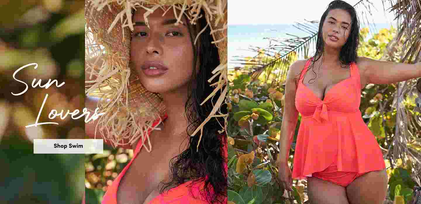 Woman wearing a bright coral swim set with a bow-front top, posing in tropical beach scenery with greenery and ocean in the background. Text reads Sun Lovers and Shop Swim