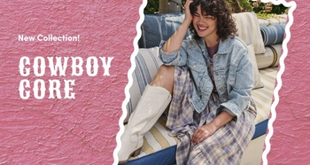 New Collection: Cowboy Core. Woman smiling in a denim jacket, plaid dress, and white cowboy boots, sitting on an outdoor bench with pillows.