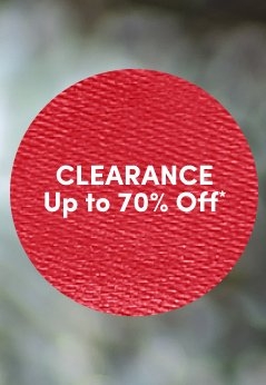 'Red circular badge with a subtle textured fabric-like surface and white centered text that reads CLEARANCE Up to 70% Off*, set against a softly blurred gray and green background.'