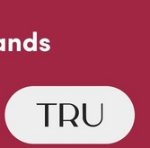 A square banner with a deep pink to burgundy gradient background. At the top, large white text reads 'ur Exclus' (partially visible, likely part of 'Our Exclusive' or similar phrase that extends beyond the frame). Below in the center, a white rounded rectangular pill-shaped button or badge contains black text that reads 'TRU' in a clean sans-serif font.