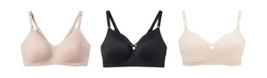 'Product lineup showing three wireless bras on white background displayed front view. Left: light pink bra with smooth V-neckline cups and adjustable straps. Center: black bra with smooth cups, small decorative detail at center V-neckline, and adjustable straps. Right: ivory or off-white bra with smooth cups, small button detail at center front, and adjustable straps.'