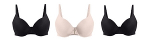 Three t-shirt bras displayed flat on a light gray background. From left to right: a black t-shirt bra with smooth molded cups and adjustable straps, a light pink t-shirt bra with smooth molded cups, a small gold-tone hardware detail at center gore, and adjustable straps, and a black t-shirt bra with smooth molded cups and adjustable straps.