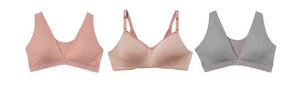 Three wire-free bralettes displayed flat on a white background. From left to right: a coral pink ribbed triangle bralette with a wide band and pull-on style, a blush pink wire-free bra with lightly lined cups, lace trim along the neckline, and adjustable straps, and a heather gray triangle bralette with a wide band and pull-on style.