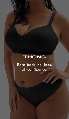 Model shown from neck to upper thighs against a dark gray background, wearing a black wire-free plunge bra with smooth cups, wide band, and crisscross strap detail at center front, paired with a black thong with a smooth waistband. Model has long dark wet-look hair and one hand resting on hip with nude nail polish visible. White text overlay reads 'THONG' with subtext below reading 'Bare-back, no-lines, all-confidence.'