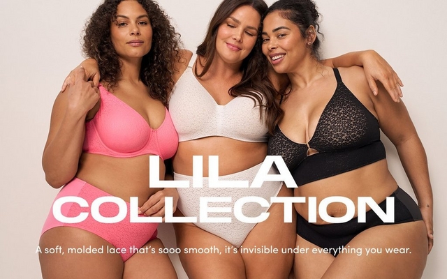 'A tall promotional banner with a light beige background featuring three plus-size models posing closely together in lingerie. The model on the left wears a pink lace underwire bra and matching high-waist briefs. The model in the center wears a white lace wireless bra and matching high-waist briefs. The model on the right wears a black lace bralette and matching briefs. All three models have long dark hair and warm expressions. Overlaid in large bold white text reads Lila Collection, with the tagline below in smaller white text reading A soft, molded lace that's sooo smooth, it's invisible under everything you wear.'