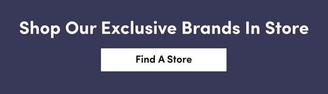A promotional banner with a solid navy blue background. White text on the left reads 'Shop Our Exclusive Brands In Store' in a bold sans-serif font. On the right, a white rectangular button contains black text reading 'Find A Store'.
