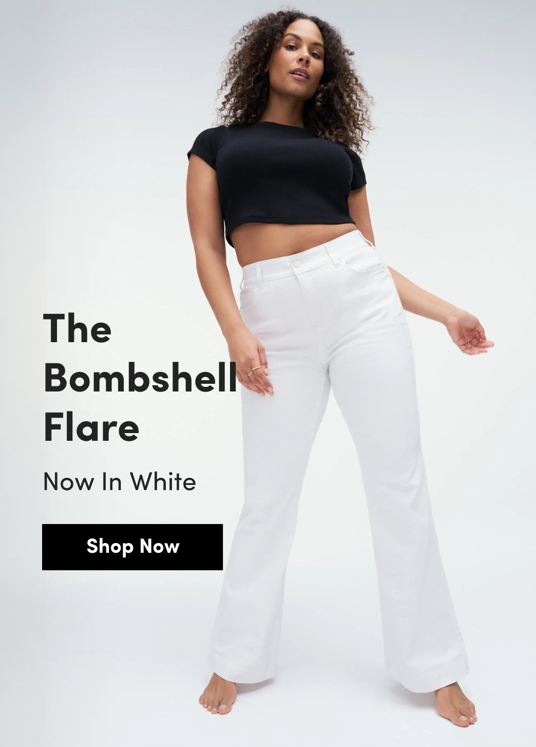Model wearing white flare jeans styled with a black cropped top, standing against a white background. Text reads “The Bombshell Flare Now In White” and “Shop Now.”