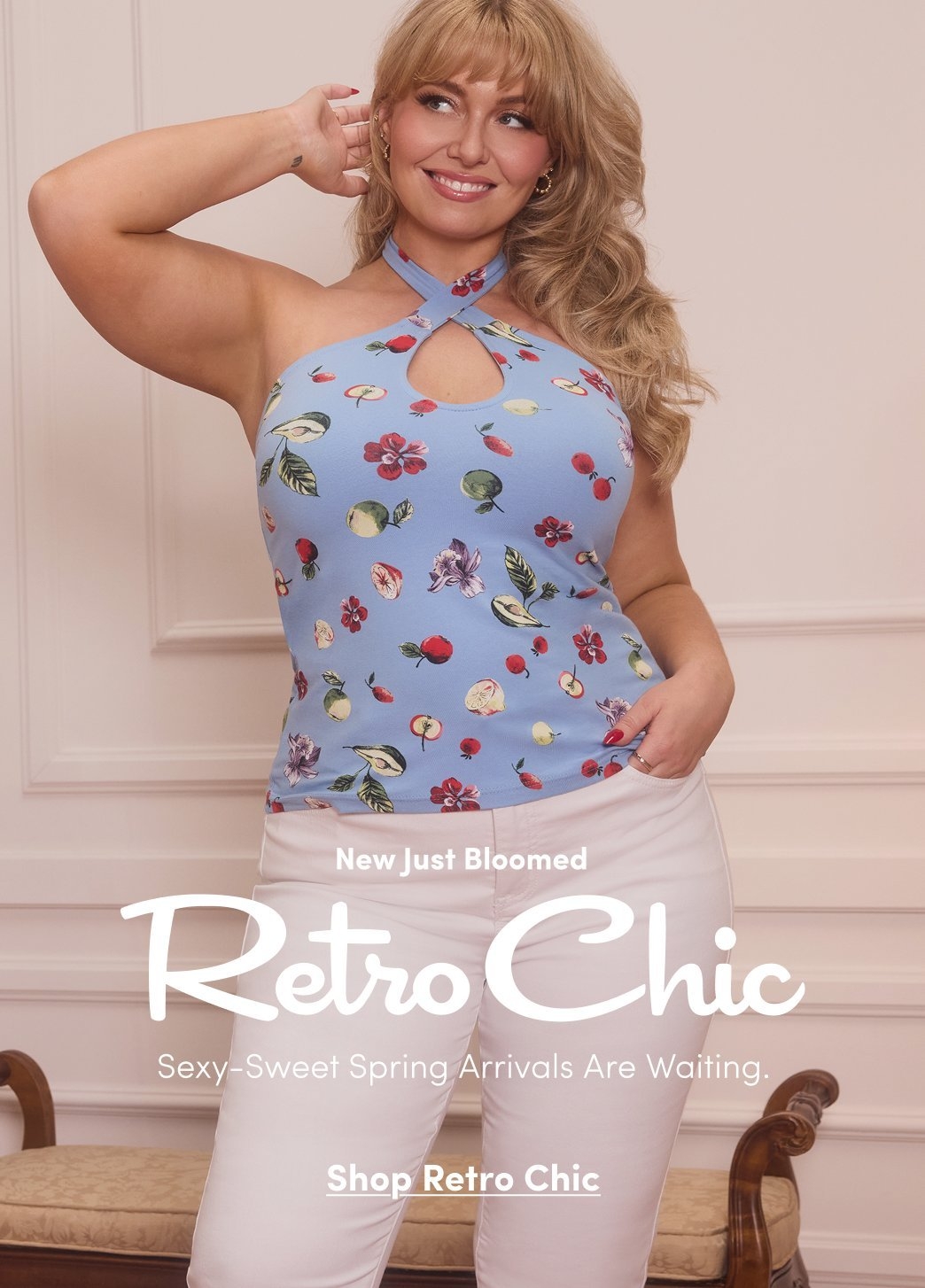 Promotional image for Retro Chic. A model wears a blue halter top with a keyhole neckline and fruit and floral print, paired with white pants. Text reads “New Just Bloomed Retro Chic. Sexy-Sweet Spring Arrivals Are Waiting.” with “Shop Retro Chic” below.