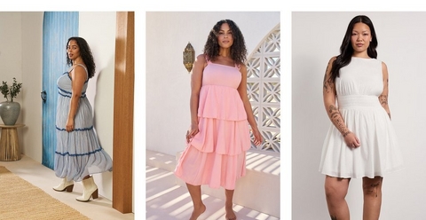 Three side-by-side photos of women wearing dresses. In the first photo, a woman with curly dark hair and pearl drop earrings stands in a bright entryway, glancing over her shoulder, wearing a white and blue gingham sleeveless midi dress with blue ruffle trim at the tiered skirt, paired with white heeled cowboy boots. Behind her is a bright blue painted door, a wood door frame, a woven jute rug, a round wood side table, and a large gray ceramic vase with a small potted plant. In the second photo, a woman with long curly dark hair stands barefoot on a sunlit white tile surface in front of a white decorative lattice screen wall with a gold Moroccan lantern hanging in the upper left, wearing a light pink sleeveless square-neck tiered midi dress with ruffle trim at each tier. In the third photo, a woman with long dark hair and tattoos covering both arms stands against a plain light gray background wearing a white sleeveless boat-neck mini dress with a smocked waist and a flared skirt.