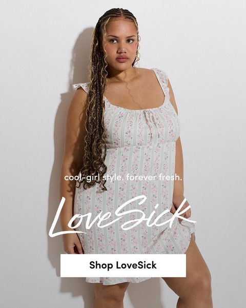 A promotional banner for 'LoveSick' with the tagline 'cool-girl style. forever fresh.' and a white 'Shop LoveSick' button overlaid on a photo. A woman with long box braids with blonde highlights and hoop earrings stands against a light gray background looking to the side. She wears a white sleeveless mini dress with ruffle shoulder straps, a gathered square neckline with tie detail, and an allover pink floral and green stripe print with ruffle hem.