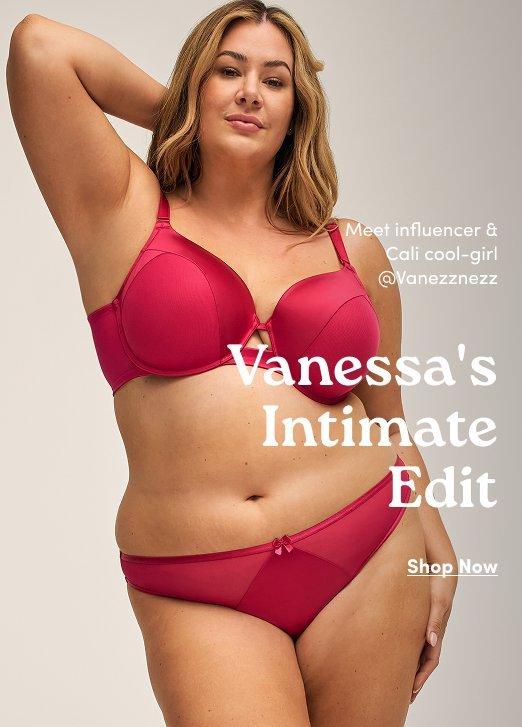 A promotional advertisement featuring a curvy blonde woman modeling a matching magenta lingerie set against a neutral cream background. She is wearing a satin-finish underwire bra with sheer mesh paneling and matching bikini-style panties with a small bow detail.