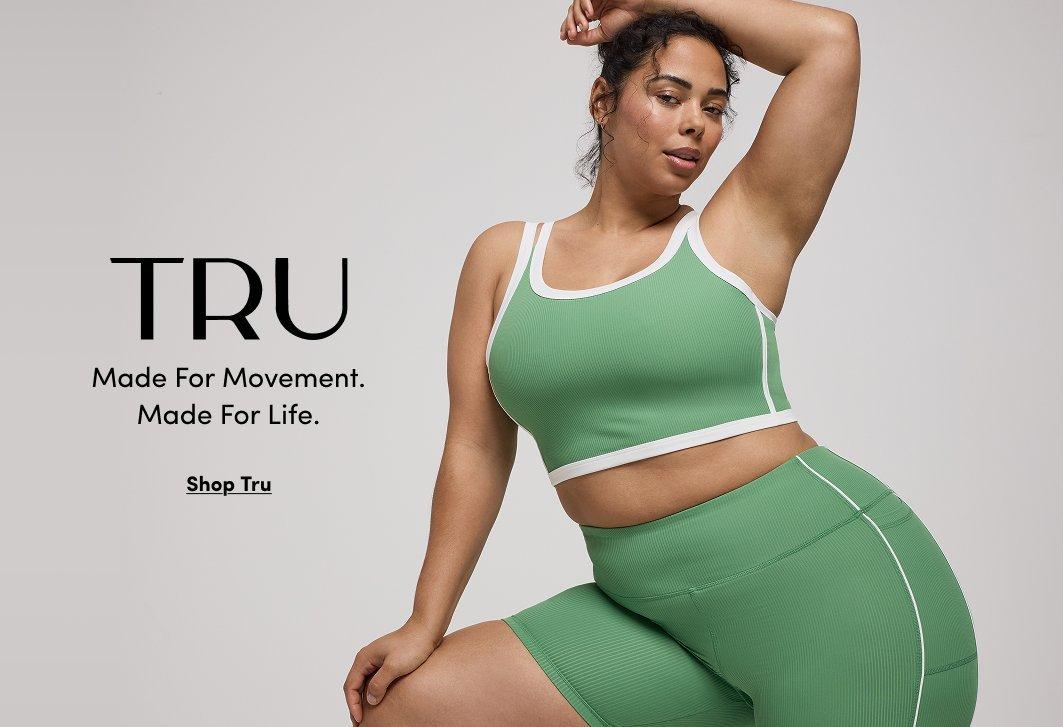"Torrid TRU activewear advertisement: Model in a ribbed sage green sports bra and matching high-waisted shorts. Text: TRU Made For Movement. Made For Life. Shop Tru."