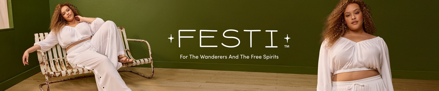A promotional banner for 'Festi™' with the tagline 'For The Wanderers And The Free Spirits' in white text on a dark olive green wall background with light wood flooring. The same woman appears twice on either side of the text. She has voluminous curly light brown hair and wears a white long-sleeve cropped peasant-style top with a gathered neckline paired with white wide-leg drawstring trousers and tan strappy flat sandals. On the left she reclines on a vintage distressed white metal slatted outdoor chair with one hand raised to her neck. On the right she stands facing forward in a cropped view showing the top half of the outfit.