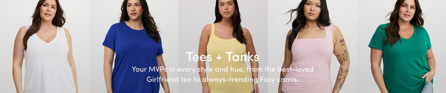 A promotional banner for 'Tees + Tanks' with the tagline 'Your MVPs in every style and hue, from the best-loved Girlfriend tee to always-trending Foxy camis.' in white text centered across five side-by-side photos against a light gray background. From left to right: a woman with long dark hair wearing a white sleeveless V-neck tank top; a woman with long dark hair wearing a royal blue short-sleeve crew neck tee; a woman with long dark hair and hoop earrings wearing a pale yellow ribbed square-neck cami; a woman with long dark hair and tattoos on one arm wearing a light pink ribbed square-neck tank top; and a woman with long dark hair wearing an emerald green short-sleeve V-neck tee with her hand in her pocket.