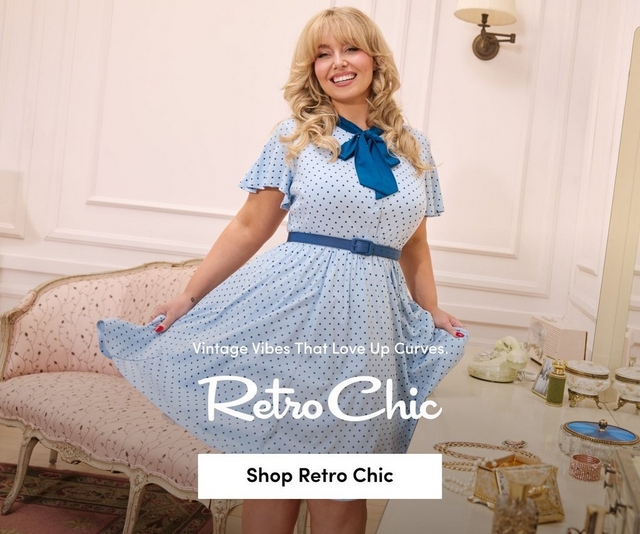 'Promotional banner for Torrid featuring Retro Chic, set in an elegant vintage-styled room with white paneled walls, a wall-mounted brass lamp, a pink floral upholstered settee, and a small vanity table with a cream rotary telephone and jewelry visible on the right side. A plus-size woman with light skin tone and long wavy blonde hair with bangs stands smiling broadly, holding out the skirt of her dress with both hands and showing red nail polish. She is wearing a light blue polka dot fit-and-flare midi dress with flutter sleeves, a teal satin bow at the collar, and a matching teal belt at the waist. Smaller white text reads 'Vintage Vibes That Love Up Curves.' above large white cursive script text reading 'Retro Chic'. At the bottom is a white rectangular button with bold dark text reading 'Shop Retro Chic'.'
