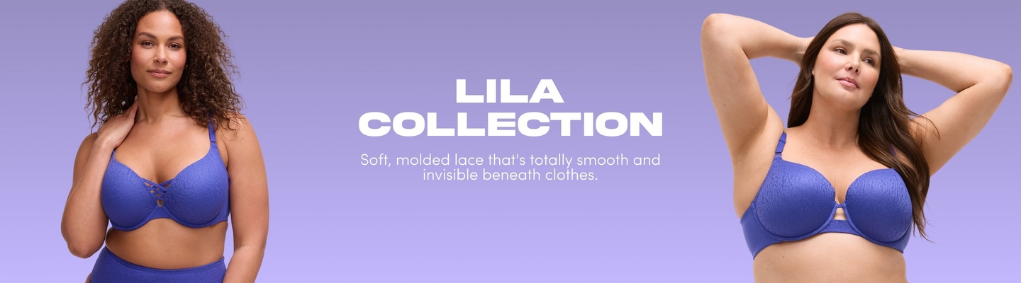 'Promotional banner for Torrid featuring the Lila Collection against a solid periwinkle purple background. Two plus-size women are positioned on either side of the banner. On the left, a woman with medium skin tone and shoulder-length curly dark brown hair stands with one hand raised to her neck, wearing a periwinkle blue lace underwire bra with a strappy criss-cross detail at the center front and matching high-waist briefs. On the right, a woman with light skin tone and long dark brown hair poses with both arms raised above her head, wearing a periwinkle blue lace-textured balconette bra with a small keyhole cutout at the center front. In the center, large bold white text reads 'LILA COLLECTION' with smaller white text below reading 'Soft, molded lace that's totally smooth and invisible beneath clothes.'.'