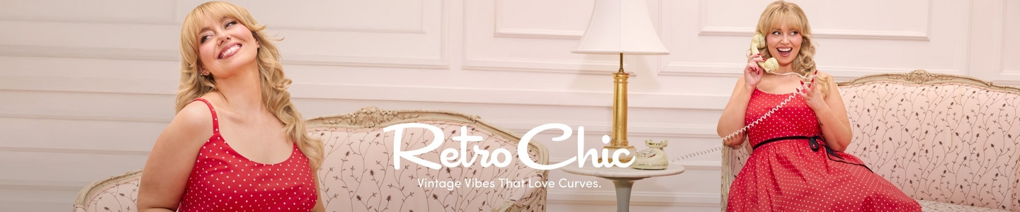 'Promotional banner for Torrid featuring Retro Chic, set in an elegant vintage-styled room with white paneled walls and a cream floral upholstered settee. The same plus-size woman with light skin tone and long wavy blonde hair appears twice in a split composition. On the left she sits on the settee smiling and looking upward, wearing a red polka dot spaghetti strap midi dress. On the right she sits on the same settee laughing and holding a cream-colored vintage rotary telephone handset to her ear, wearing a red polka dot fit-and-flare midi dress with a black ribbon belt at the waist. Between the two poses, a small round side table holds a cream-colored rotary telephone base and a gold and cream table lamp. Overlaid across the center in large white cursive script text is 'Retro Chic' with smaller white text below reading 'Vintage Vibes That Love Curves.'.'