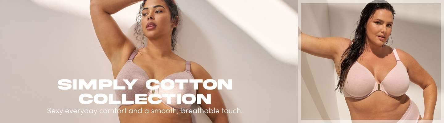 'A promotional banner for the Simply Cotton Collection featuring two models. On the left, a woman with dark curly hair poses with one arm raised behind her head against a warm beige wall with soft diagonal light and shadow. She wears a heathered blush pink cotton bra with gold hardware at the center front and adjustable straps. On the right, a plus-size woman with long dark wet hair leans forward slightly against a similar light neutral background. She wears a smooth blush pink cotton bra with gold center-front hardware and visible adjustable straps. Bold white text on the left reads 'SIMPLY COTTON COLLECTION' with smaller text below reading 'Sexy everyday comfort and a smooth, breathable touch.''