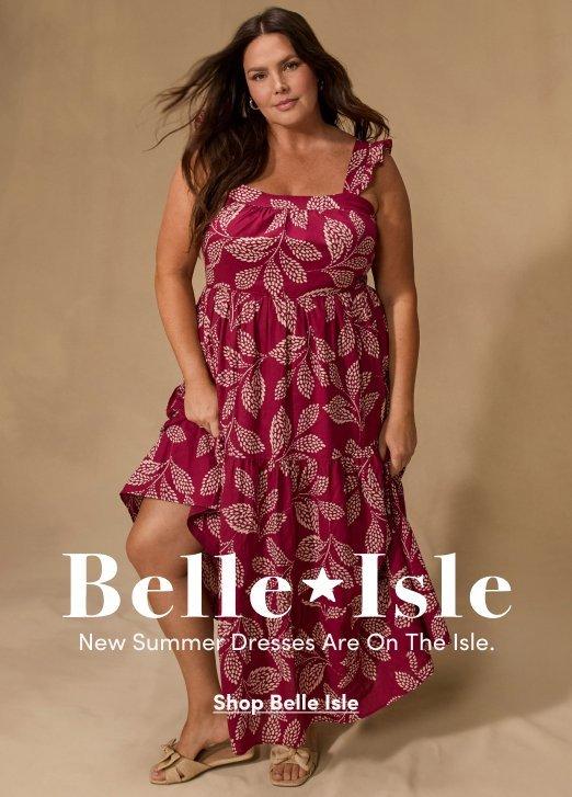 Woman wearing a berry floral maxi dress from Belle Isle collection. Image text reads Belle Isle, New Summer Dresses Are On The Isle, Shop Belle Isle.