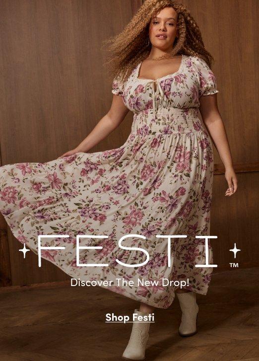 Promotional banner for Festi™ featuring a woman twirling in a cream floral maxi dress with pink roses, short puff sleeves, and a smocked waist, styled with white cowboy boots. Text reads: "Festi™ – Discover The New Drop! Shop Festi."