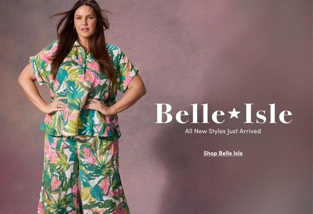 Promotional image for Belle Isle featuring a model wearing a tropical print short-sleeve button-up top with matching wide-leg pants against a mauve background. Text reads “Belle Isle. All New Styles Just Arrived” with “Shop Belle Isle” below.