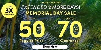 A promotional banner with a bright blue and green painterly tropical background featuring leafy foliage.A promotional banner with a bright blue and green painterly tropical background featuring leafy foliage. In the upper left corner, a small dark circular badge reads 'EARN 3X TORRID CASH'. At the top center, small white text reads 'ONLINE + IN STORE' above bold white text reading 'EXTENDED 2 MORE DAYS!' followed by bold white text reading 'MEMORIAL DAY SALE'. Below that, two large bold yellow numbers are displayed side by side: '50' with a white '%' and 'OFF' below it followed by white text reading 'Regular Price*', and '70' with a white '%' and 'OFF' below it followed by white text reading 'Clearance*', preceded by small white text reading 'UP TO'. At the bottom center is a white rounded pill button with bold black text reading 'Shop Now'.