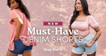 Promotional banner for 'Must-Have Denim Shorts' featuring two models against a dusty pink textured background. The left model is shown from behind wearing a light pink flutter-sleeve top and medium-wash denim shorts. The right model faces forward wearing a pink smocked square-neck puff-sleeve top and light-wash denim shorts. Text overlays read 'New', 'Must-Have Denim Shorts', and 'Shop Shorts'.