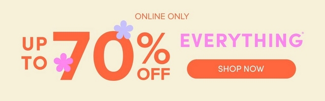 A wide horizontal promotional banner with a soft cream background. Small coral text at the top center reads 'ONLINE ONLY'. Large bold coral text on the left reads 'UP TO 70% OFF' with two small decorative flower icons in purple and pink placed near the '70'. Bold pink text to the right reads 'EVERYTHING*'. Below that is a coral orange rounded pill button with white text reading 'SHOP NOW'.