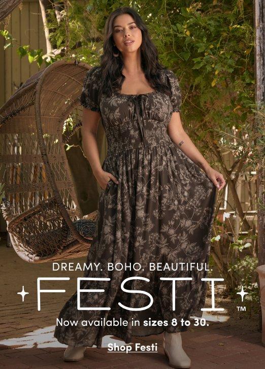 Model wearing a dark floral maxi dress with short puff sleeves and a smocked bodice, styled with light-colored ankle boots in an outdoor garden setting. Text reads, “Dreamy. Boho. Beautiful. FESTI. Now available in sizes 8 to 30.” with a “Shop Festi” call to action.