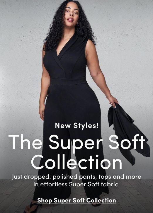 Banner ad for the Super Soft collection. A woman with long brown hair stands against a green background, wearing a teal V-neck top with a matching wrap tied at the waist, black wide-leg pants, and black heels. Text reads: New To The Super Soft Collection, Shop Pants.
