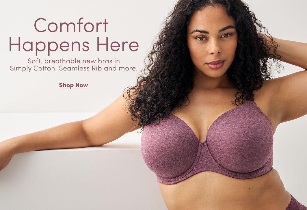 Banner ad for a new bra collection. A woman with curly dark hair sits against a white background, wearing a mauve heathered underwire bra. Text reads: Comfort Happens Here, Soft, breathable new bras in Simply Cotton, Seamless Rib and more, Shop Now.