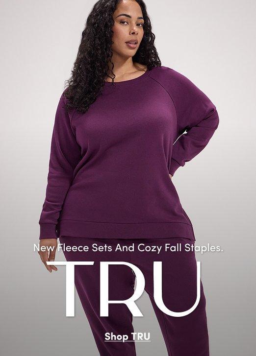 TRU fleece collection featuring a model in a matching purple sweatshirt and pants.