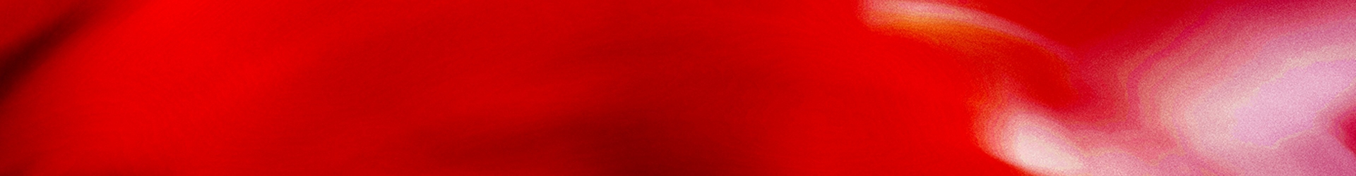 Abstract wide banner image of a deep red background with soft swirling light patterns, transitioning to lighter pink and orange tones on the right side. No people, text, or objects are present in the image.