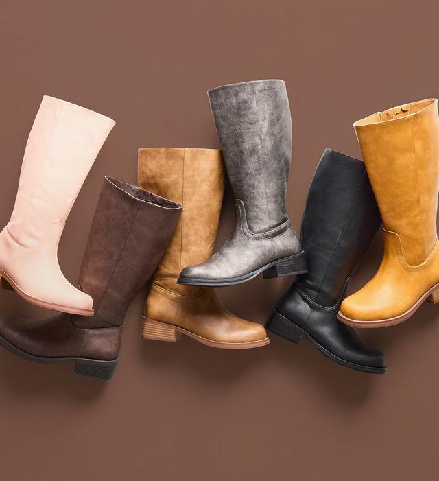 Six knee high boots arranged standing upright against a brown background, in blush pink, dark brown, tan, gray metallic, black, and mustard yellow, each with a block heel.