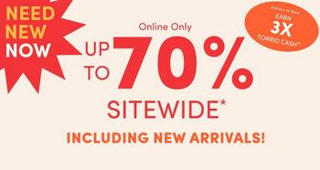 Bright orange background with white text overlaid. In the top left corner, a red starburst shape contains white text reading 'NEED NEW NOW'. At the top center, small white text reads 'Online Only'. In the top right corner, a red circular badge contains white text reading 'Deluxe & Diehard Earn 3X TORRID CASH'. Below that, large bold white text reads 'UP TO 70% SITEWIDE' with an asterisk. At the bottom, bold white text reads 'INCLUDING NEW ARRIVALS!'. No people appear in the image.