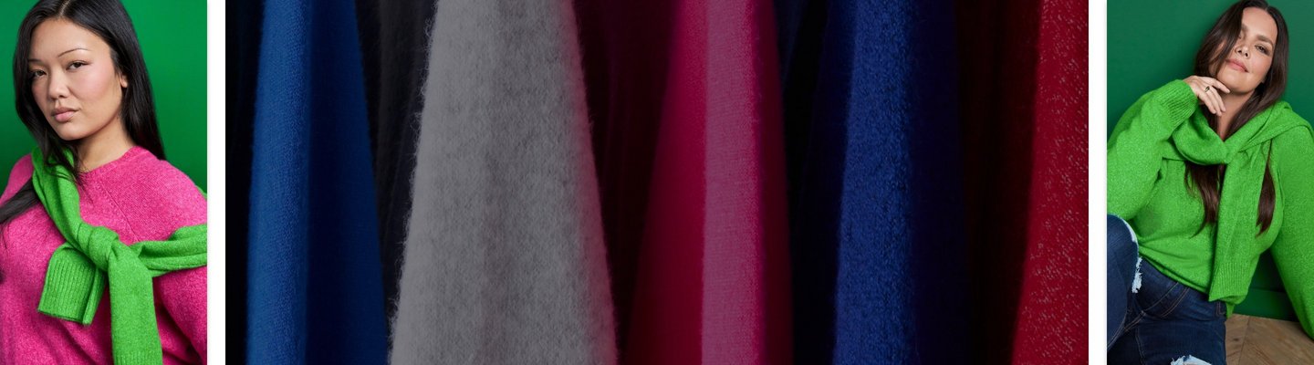 Models wearing bright sweaters.
