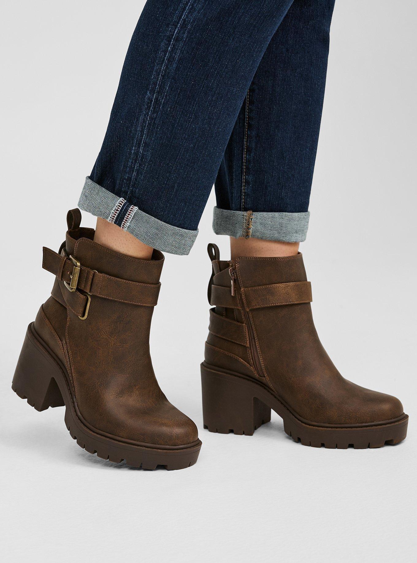 Strappy shop buckle boots